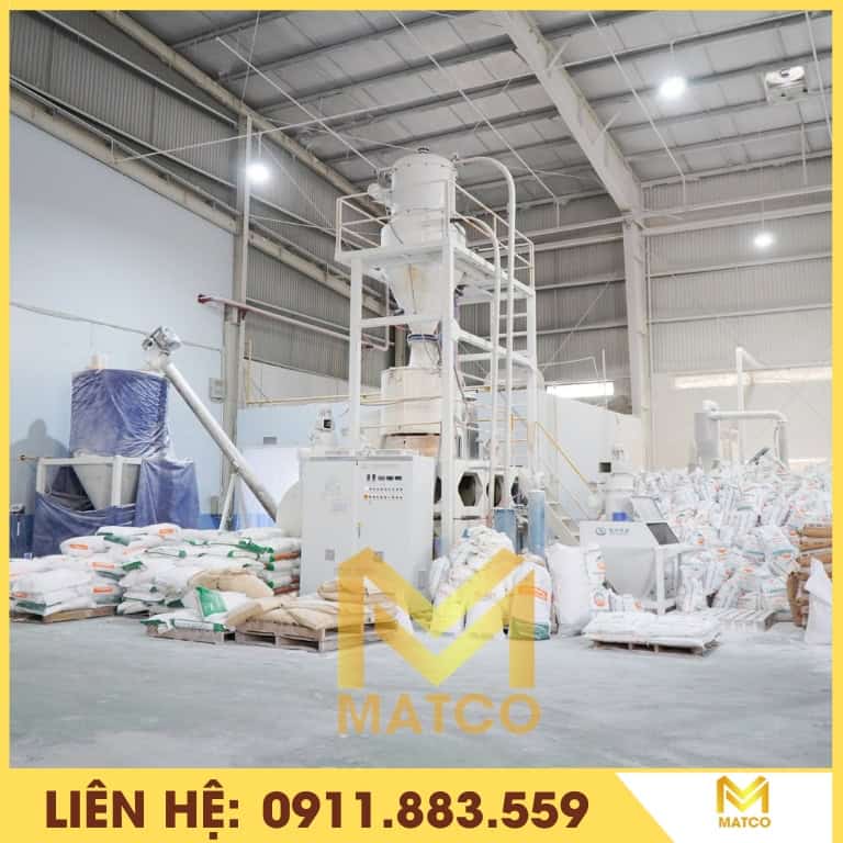 máy nén ép trộn nguyên liệu